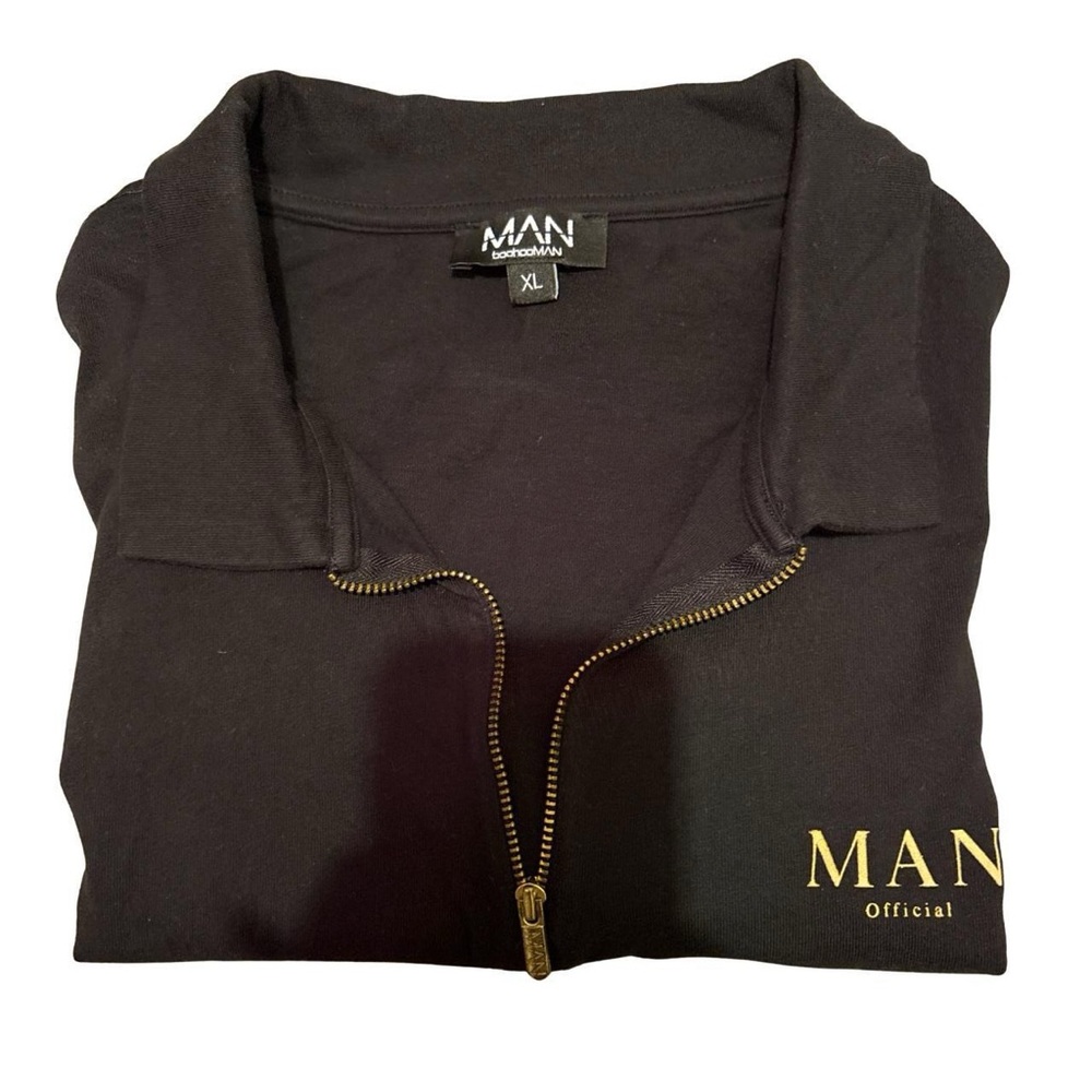 MAN Official Men's Black Polo Shirt